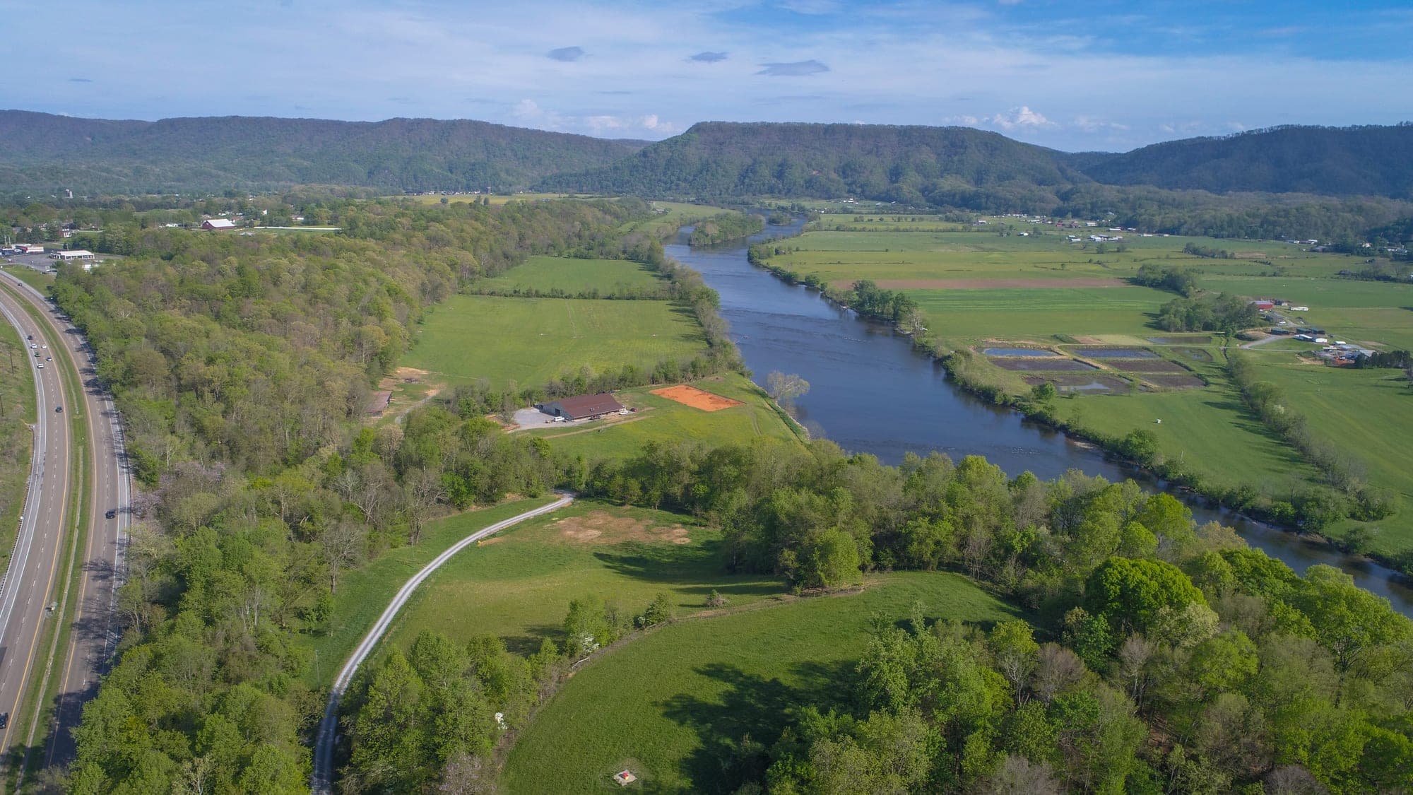 Aerial view of the barn and surrounding land